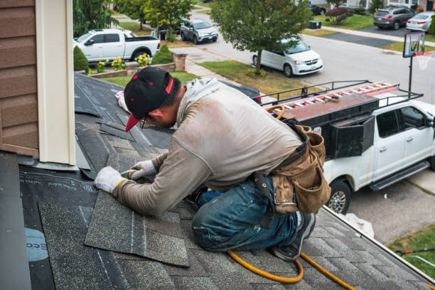 Professional Roof Replacement technician working in Monterey, IN